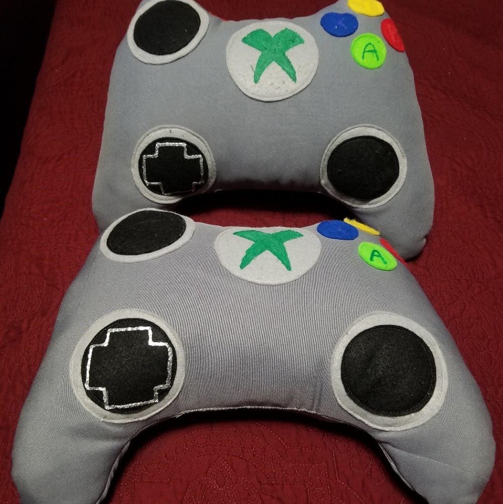 Two nintendo controllers pillows